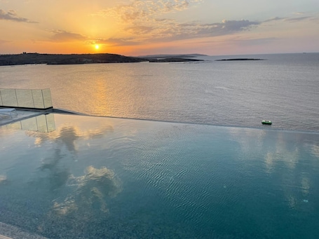 Indoor pool, seasonal outdoor pool, pool umbrellas, sun loungers