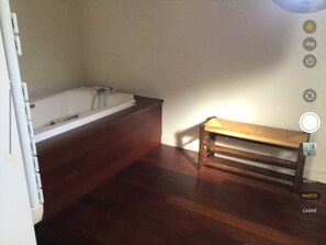 Bathtub, jetted bath, hair dryer, towels