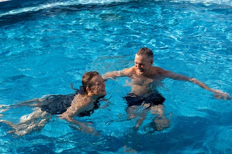 Indoor pool, outdoor pool, open 8:00 AM to 9:00 PM, lifeguards on site
