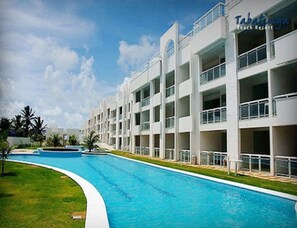 Outdoor pool - Sonia Flats - Ground floor apartment on Camurupim Beach - Beachfront condominium. (Nisia Floresta)