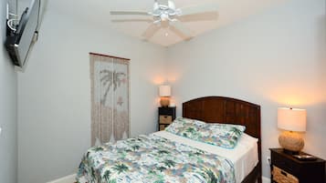 1 habitación, tabla de planchar con plancha y cuna de viaje