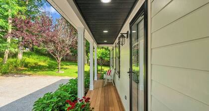 Coastal-style home with open-floor plan, ample natural light, blocks away...