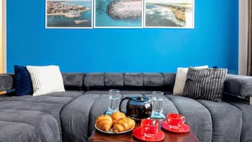 Apartment | Living area | 30-inch TV with digital channels