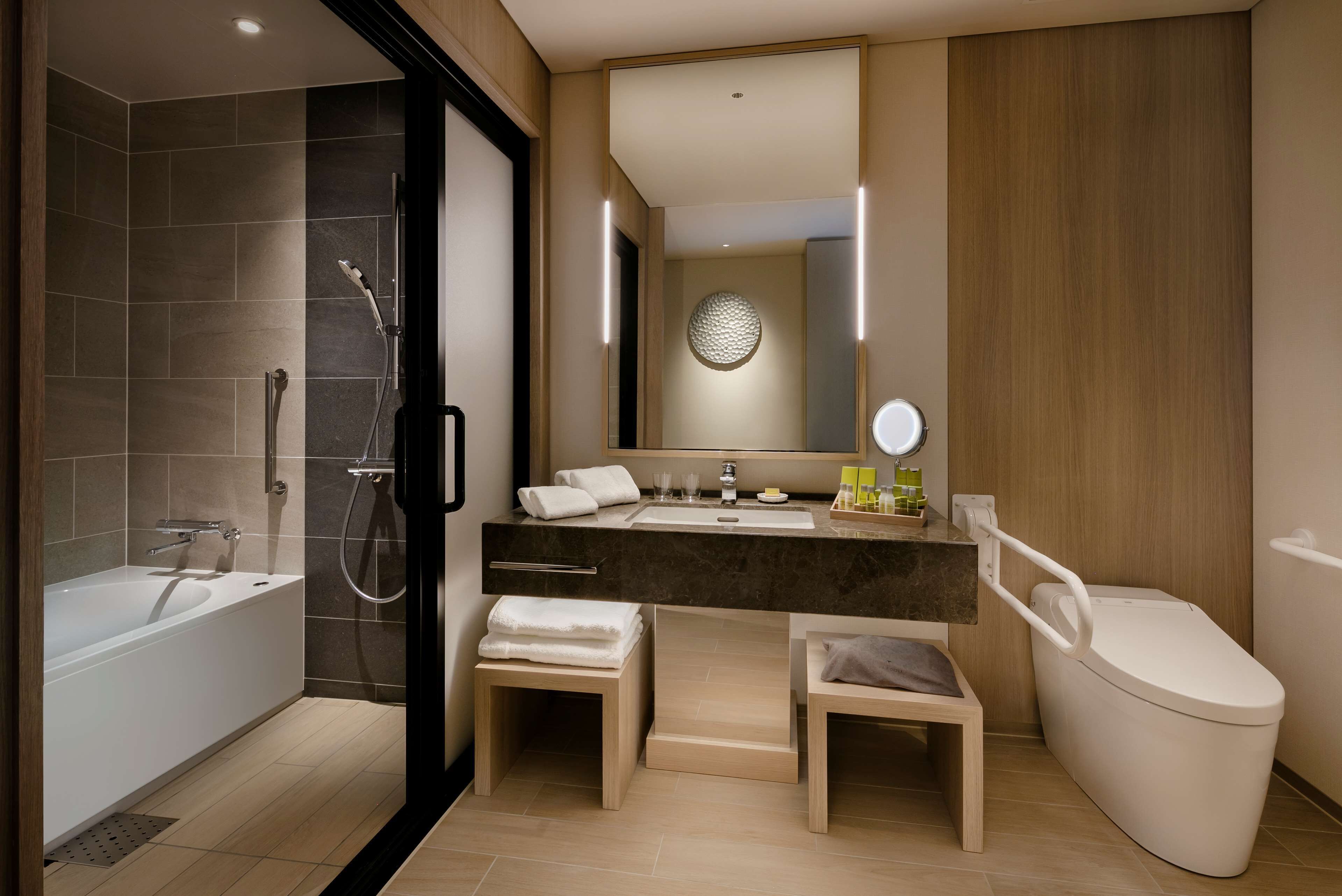 room, 1 king bed | bathroom | separate bathtub and shower, free toiletries, hair dryer, slippers