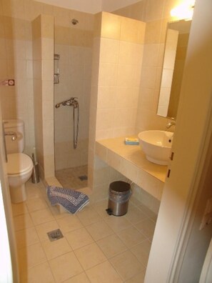 A bathroom with a toilet, shower, sink, and mirror. - Villa Katerina Large Private Pool Walk to Beach Sea Views A C Wifi Car Not Required - 1021 (Kefalonia)