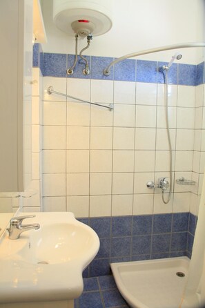 A bathroom with a sink, a toilet, and a shower. - Villa Youla Large Private Pool Walk to Beach Sea Views A C Wifi Car Not Required - 1025 (Corfu)