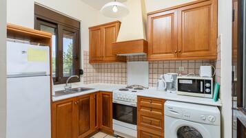 Villa | Private kitchen | High chair, cookware/dishes/utensils