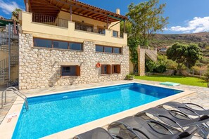 A two-story stone house with a swimming pool and outdoor seating. - Souda Bay View Large Private Pool Walk to Beach Sea Views A C Wifi - 2119 (Chania)