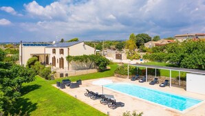 A residential property with a swimming pool, outdoor seating, and a garden. - Villa Palazzola Large Private Pool Sea Views A C Wifi - 2886 (Scicli)