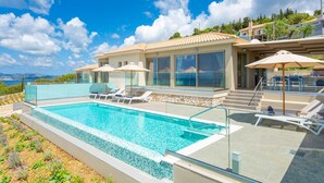 A modern villa with a private pool, outdoor seating, and a scenic ocean view. - Villa Lassi Illios Large Private Pool Walk to Beach Sea Views A C Wifi - 3055 (Kefalonia)