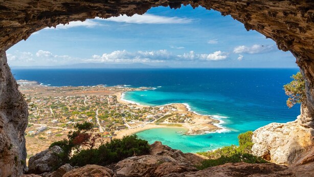 A coastal town viewed through a cave opening, with clear blue sea and rocky terrain. - Villa Lulla Large Heated Private Pool Sea Views A C Wifi - 3200 (Chania)