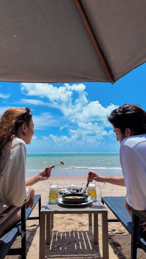 On the beach, white sand