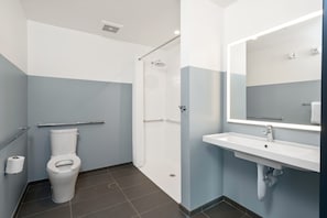Shower, rainfall showerhead, hair dryer, towels