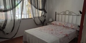 2 dormitorios, tabla de planchar con plancha, Internet y ropa de cama