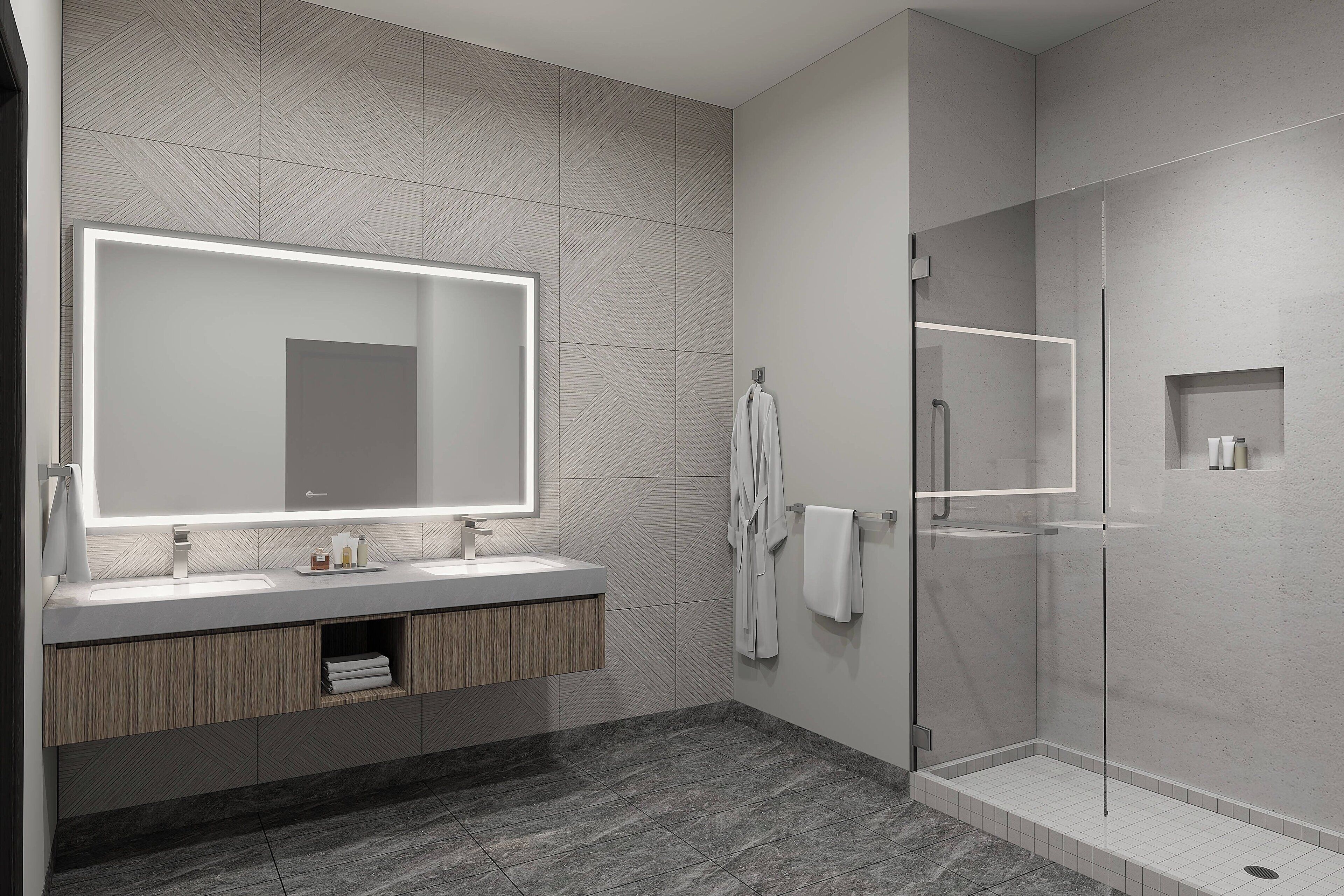 A modern bathroom with a large mirror, two sinks, a walk-in shower, and a towel rack.