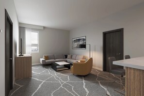 Suite, 1 habitación | Zona de estar | Una televisión de pantalla plana, Netflix, servicios de streaming
