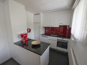 Fridge, dishwasher, cookware/dishes/utensils, dining tables