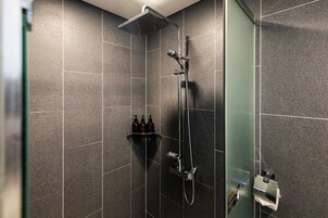 Superior Double(No View) | Bathroom | Shower, hair dryer, slippers, bidet