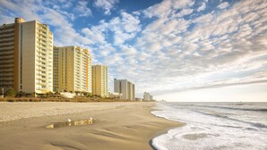 A beach with high-rise buildings in the background. - Amazing Ocean View Condo Club Wyndham Ocean Blvd in N. Myrtle Beach -1 BR/1 Bath (North Myrtle Beach)