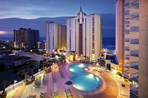A hotel with a large pool, multiple high-rise buildings, and a view of the ocean. - Amazing Ocean View Condo Club Wyndham Ocean Blvd in N. Myrtle Beach -1 BR/1 Bath (North Myrtle Beach)