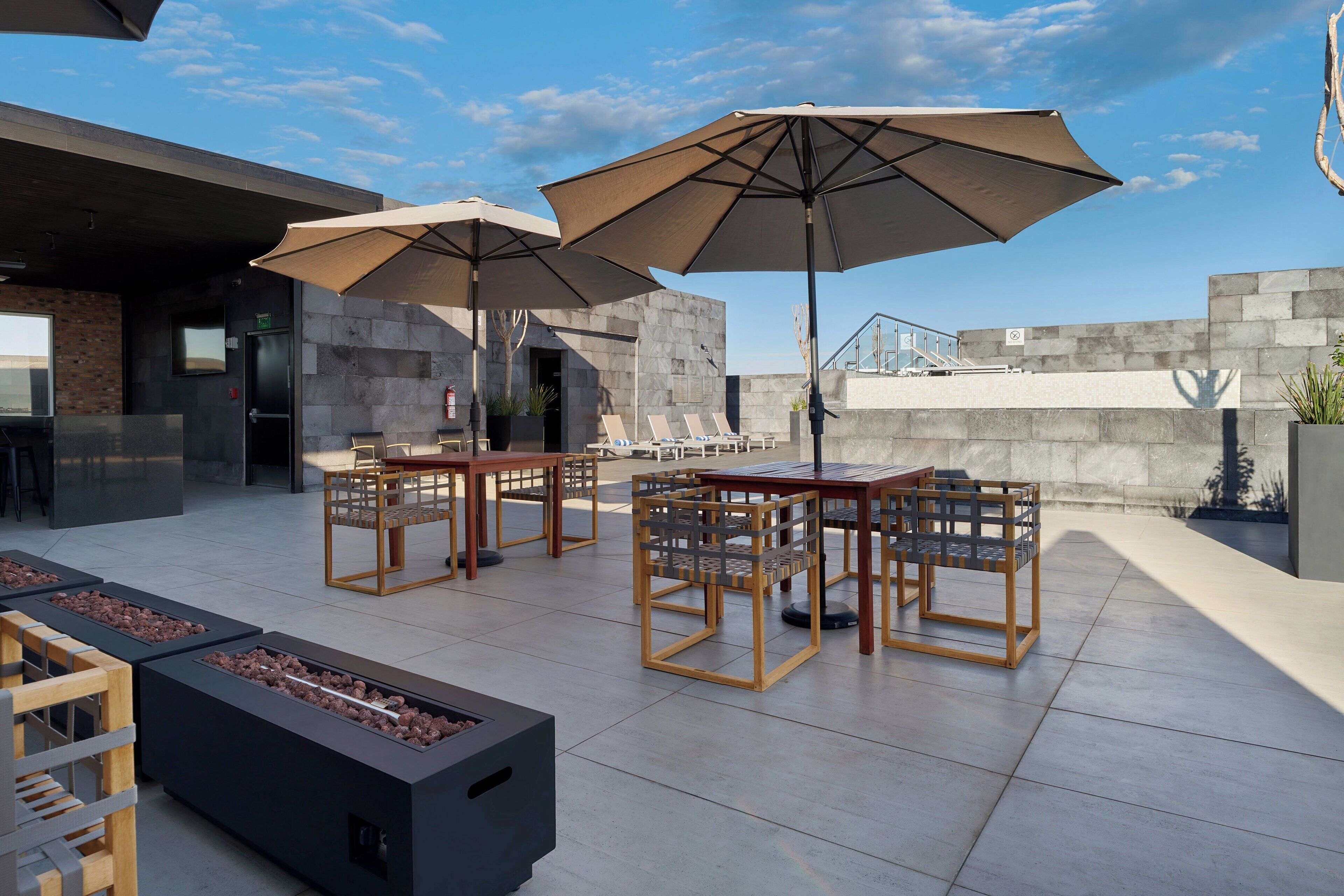 outdoor pool, open 10:00 am to 9:00 pm, pool umbrellas, pool loungers