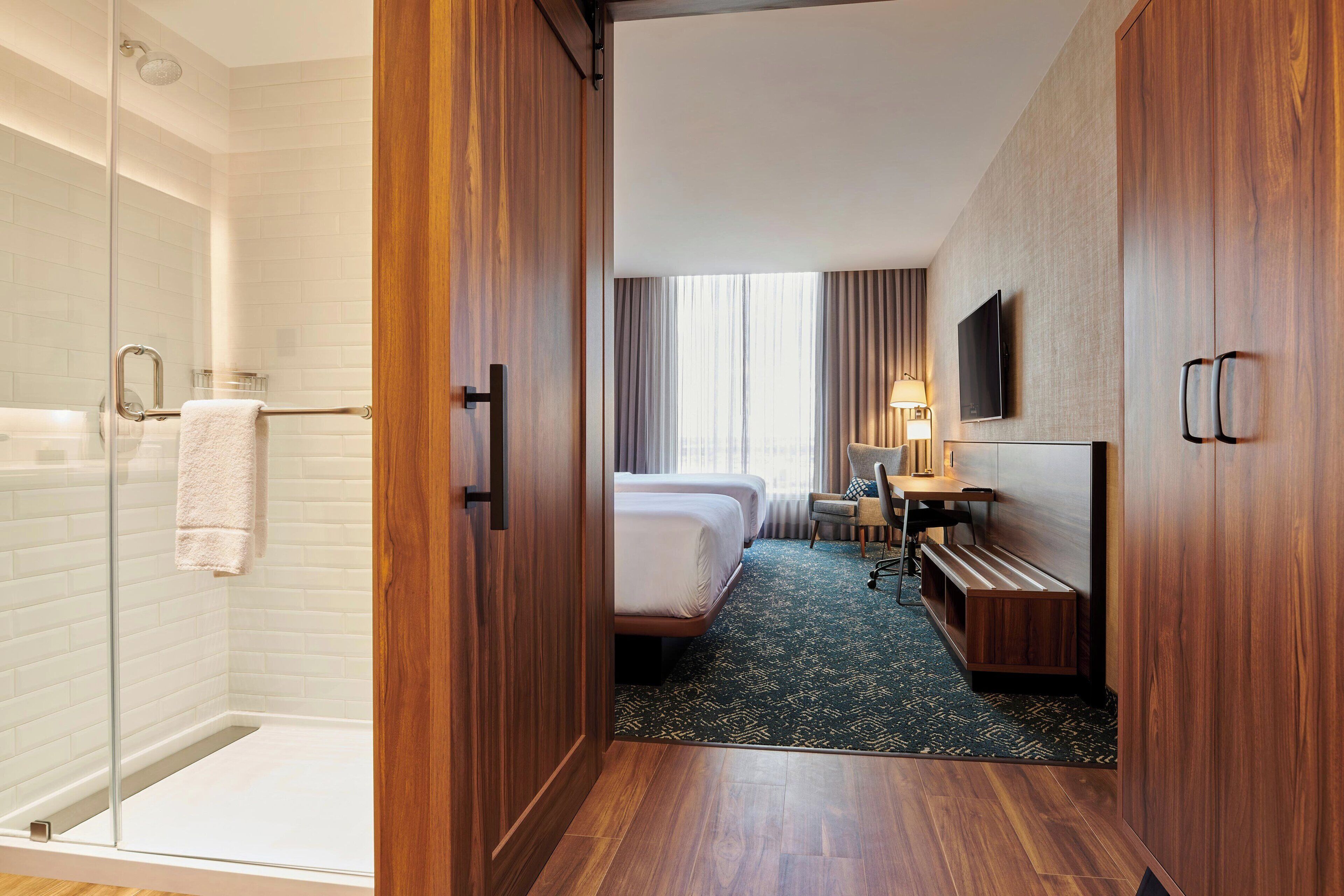 traditional room, 2 queen beds, non smoking | bathroom | combined shower/bathtub, rainfall showerhead, hair dryer