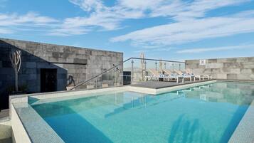 Outdoor pool, open 10:00 AM to 9:00 PM, pool umbrellas, sun loungers