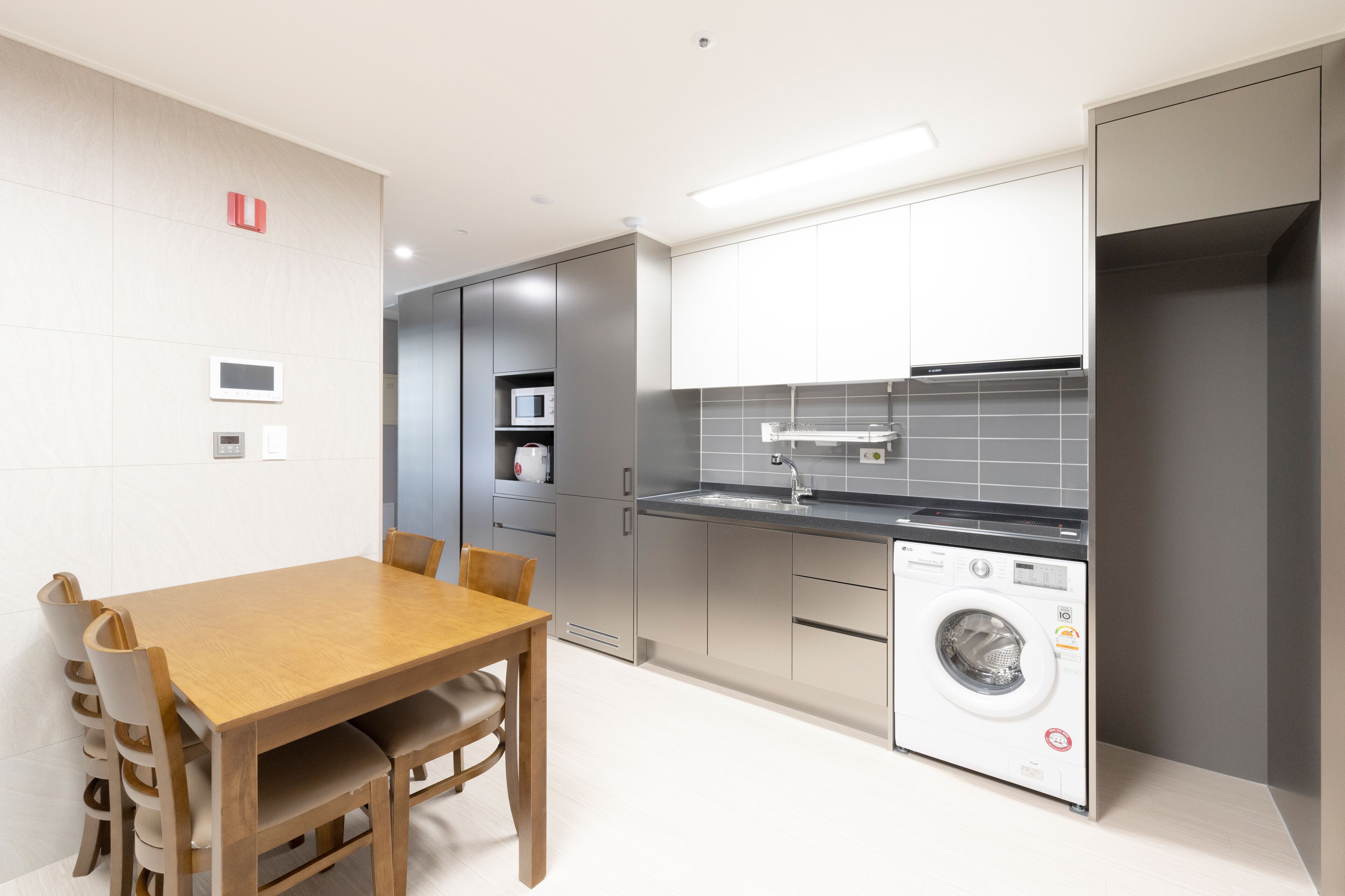 corner suite | living area | flat-screen tv, heated floors