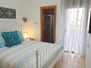 Family Apartment, 2 Bedrooms, Beach View | 2 bedrooms, desk, soundproofing, free WiFi