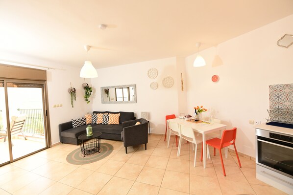 Family Apartment, 2 Bedrooms, Beach View | Living area | TV
