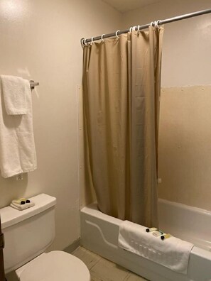 Combined shower/tub, towels, soap, shampoo