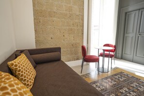 Family Room, 1 Bedroom, Balcony, City View | In-room safe, soundproofing, free WiFi, bed sheets