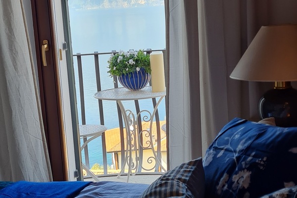 Schlafzimmer mit Blick auf den See
