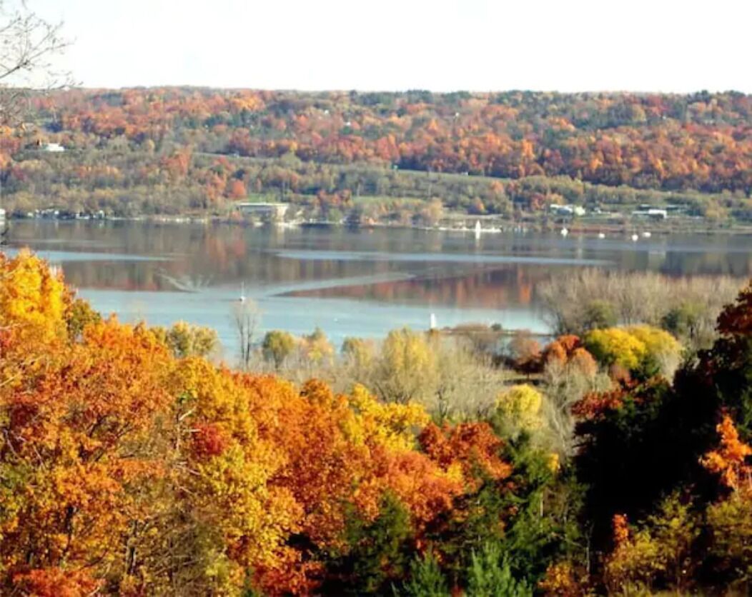 A lake surrounded by autumn foliage.