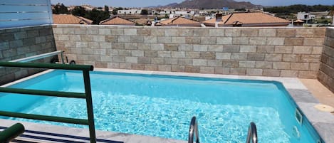 Piscina externa, piscina aquecida