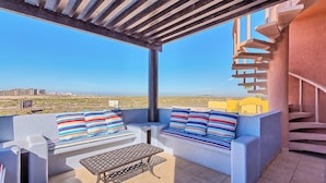 A covered outdoor seating area with a view of the cityscape. - Beautiful Sea of Cortes view Sandy Beach, Bella Vista (Puerto Peñasco)