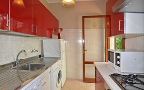 Casa familiar, varias habitaciones, 2 baños (Casa Rosalba) | Cocina privada | Horno, parrilla de estufa, lavavajillas y cafetera y tetera 