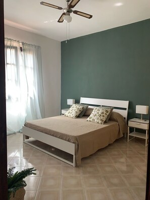 3 bedrooms, desk, iron/ironing board, travel cot