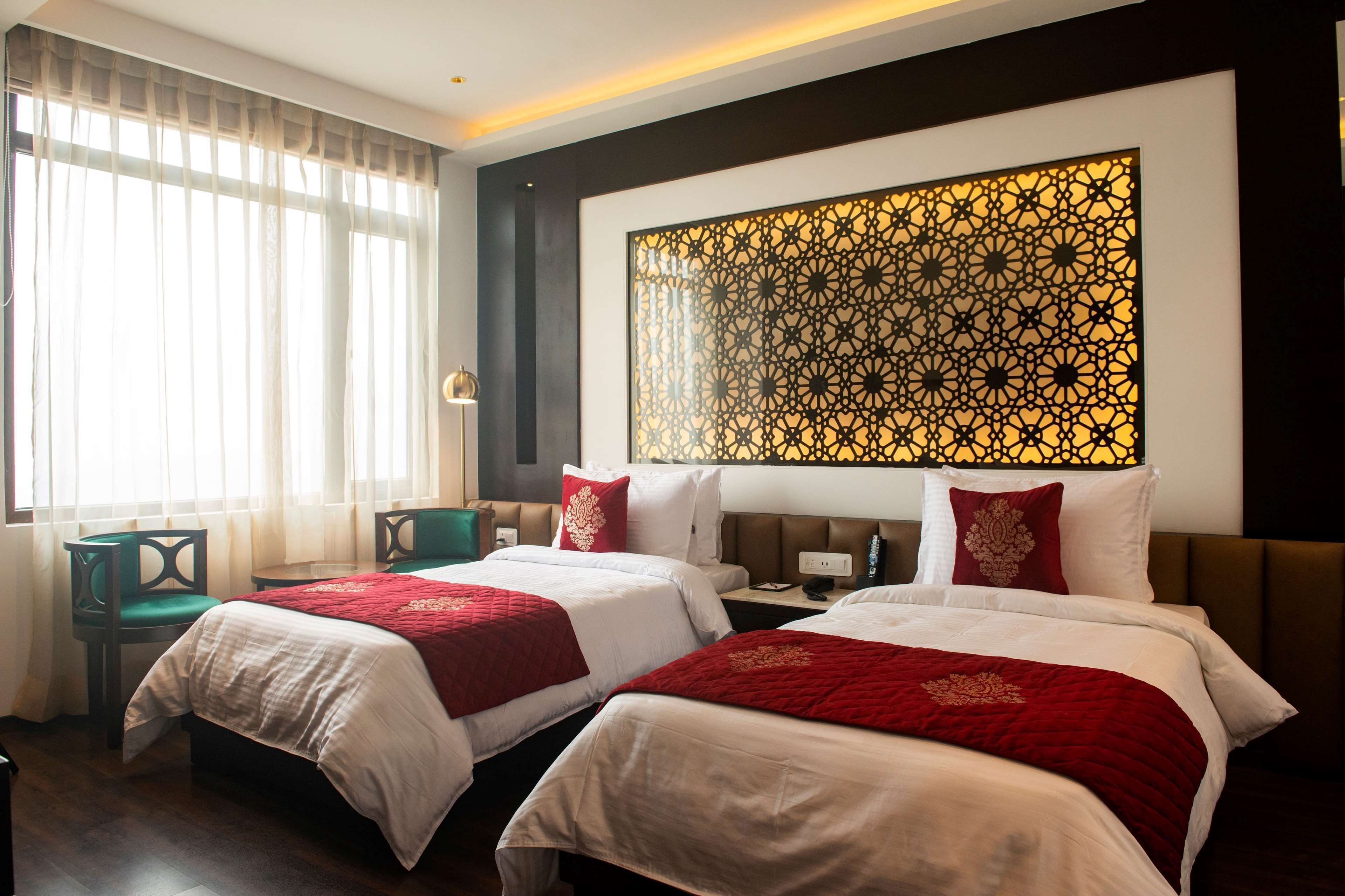 Pillow-top beds, minibar, in-room safe, desk