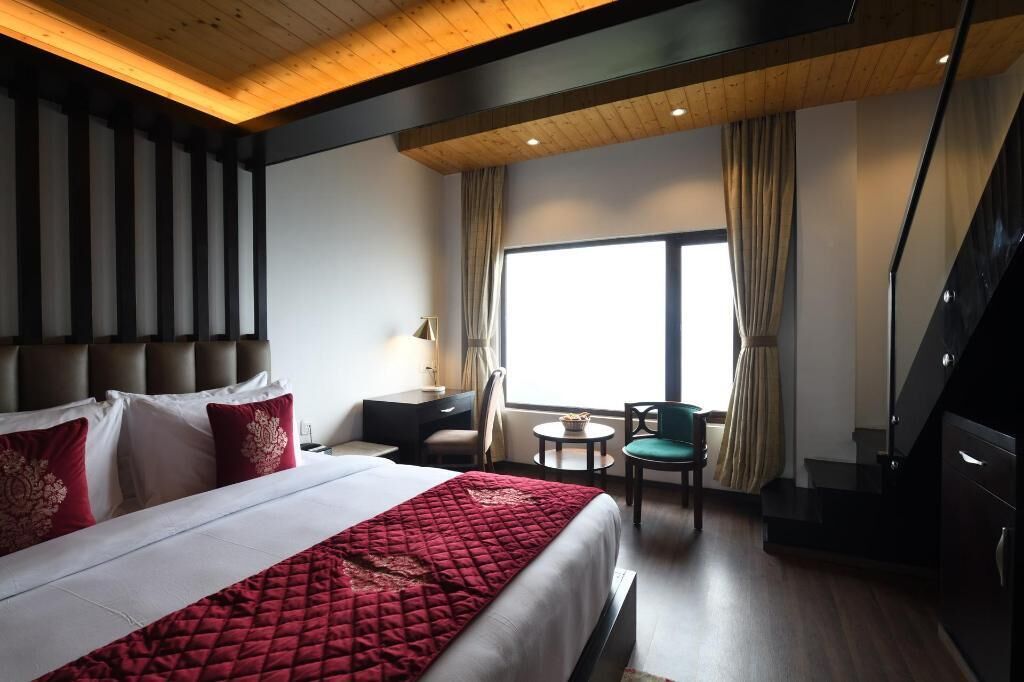 Pillow-top beds, minibar, in-room safe, desk