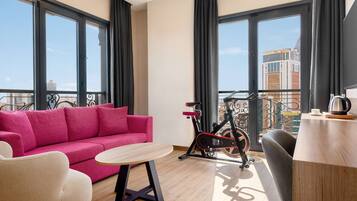 Room, 1 King Bed (Fitness Room) | Minibar, in-room safe, desk, laptop workspace