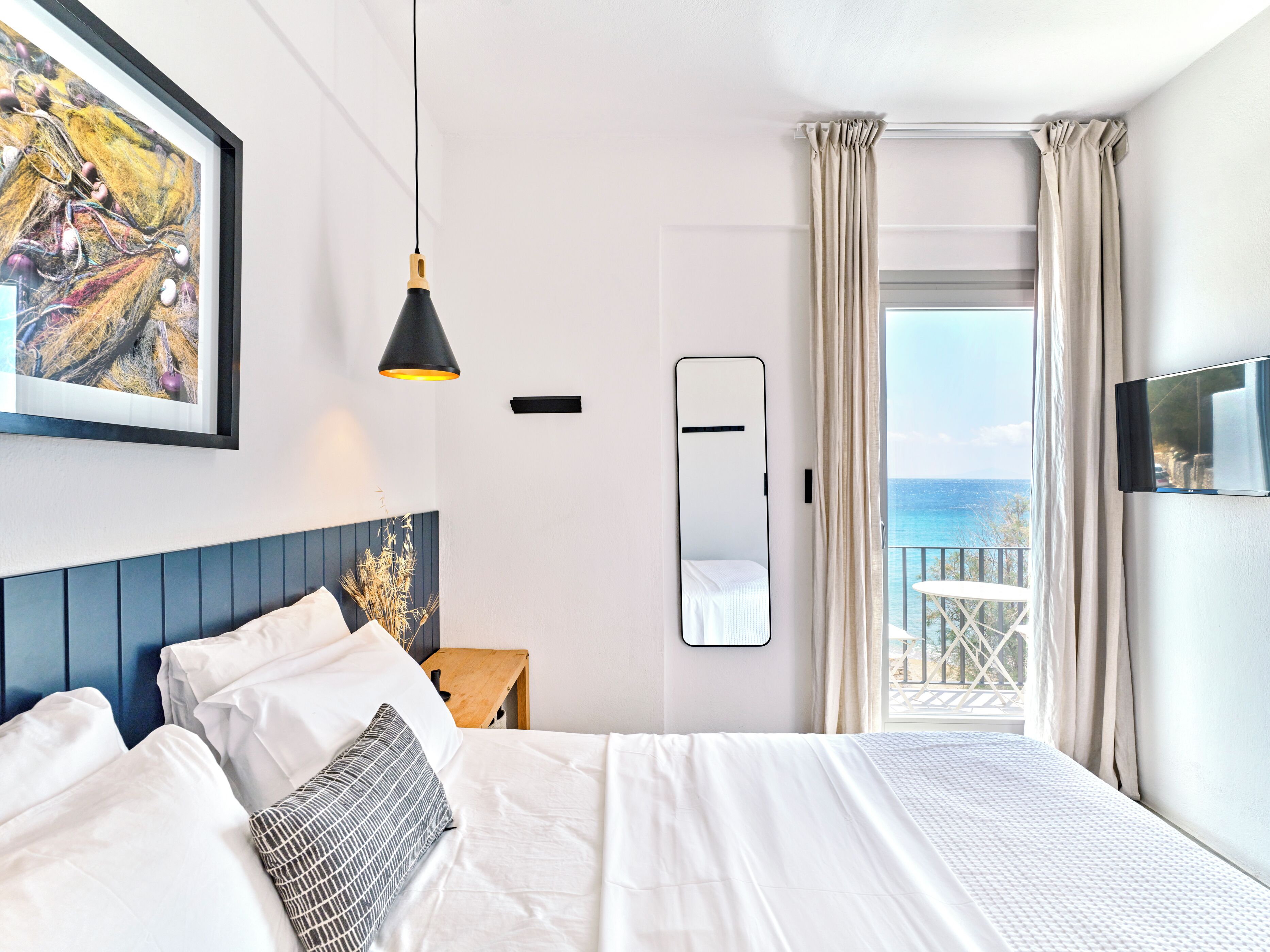 Habitación doble Deluxe, vista al mar | Caja de seguridad en la habitación y insonorización 