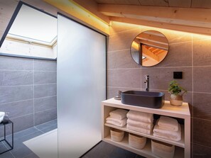 Bathtub, hair dryer, towels