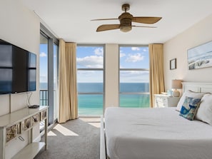 Primary Bedroom - Balcony Access + Smart TV