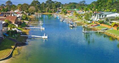 Canal Waterfront Retreat Hosts 10 Pool & Spa