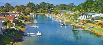 Canal Waterfront Retreat Hosts 10 Pool & Spa