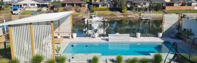 Canal Waterfront Retreat Hosts 10 Pool & Spa
