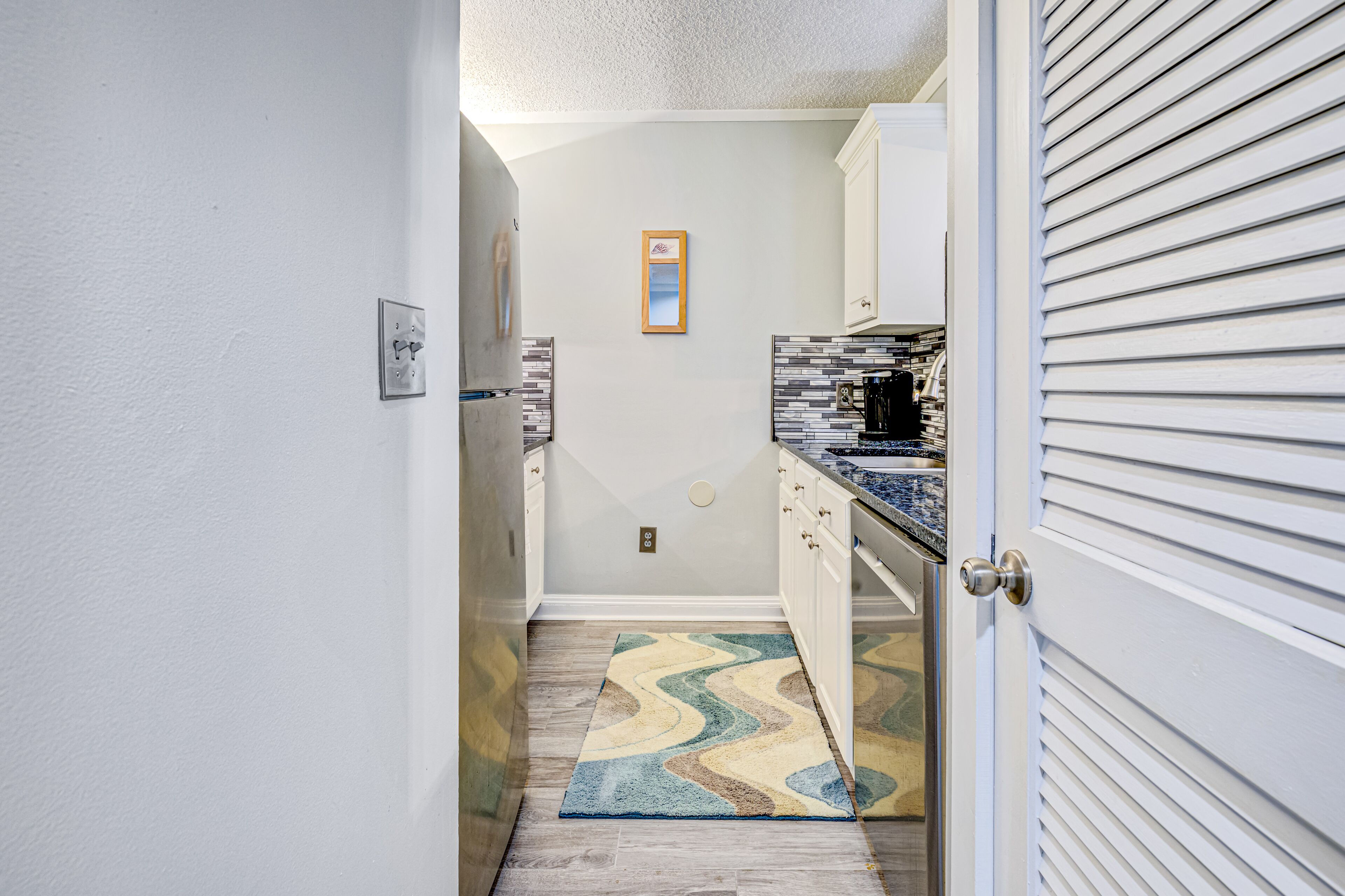 Walk to the Beach! Resort Condo w/ Balcony, AC, WiFi & Shared Pools/Hot Tub/Gym!