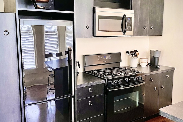 Fully equipped kitchen with Nespresso coffee/espresso maker.