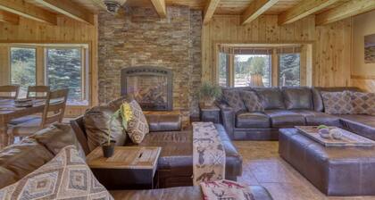 Riverfront Escape w/ Hot Tub, Pond, Fire Pit, Stables, Deck, and River Access Near Downtown Pagosa!